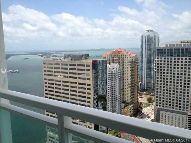 Enjoy private and beautiful view1/1 unit at The Plaza complete wood floors and Elfa closet system. All stainless steel appliances with water and basic cable included. State of the art building with gym,pool, spa, billiard room, and movie theater. Walking distance to metro mover and best dining places in Brickell. Never drive again just walk to work, Publix, banks, and shops.