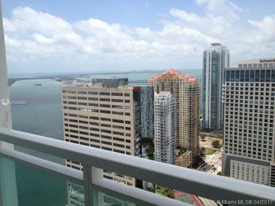 Enjoy private and beautiful view1/1 unit at The Plaza complete wood floors and Elfa closet system. All stainless steel appliances with water and basic cable included. State of the art building with gym,pool, spa, billiard room, and movie theater. Walking distance to metro mover and best dining places in Brickell. Never drive again just walk to work, Publix, banks, and shops.