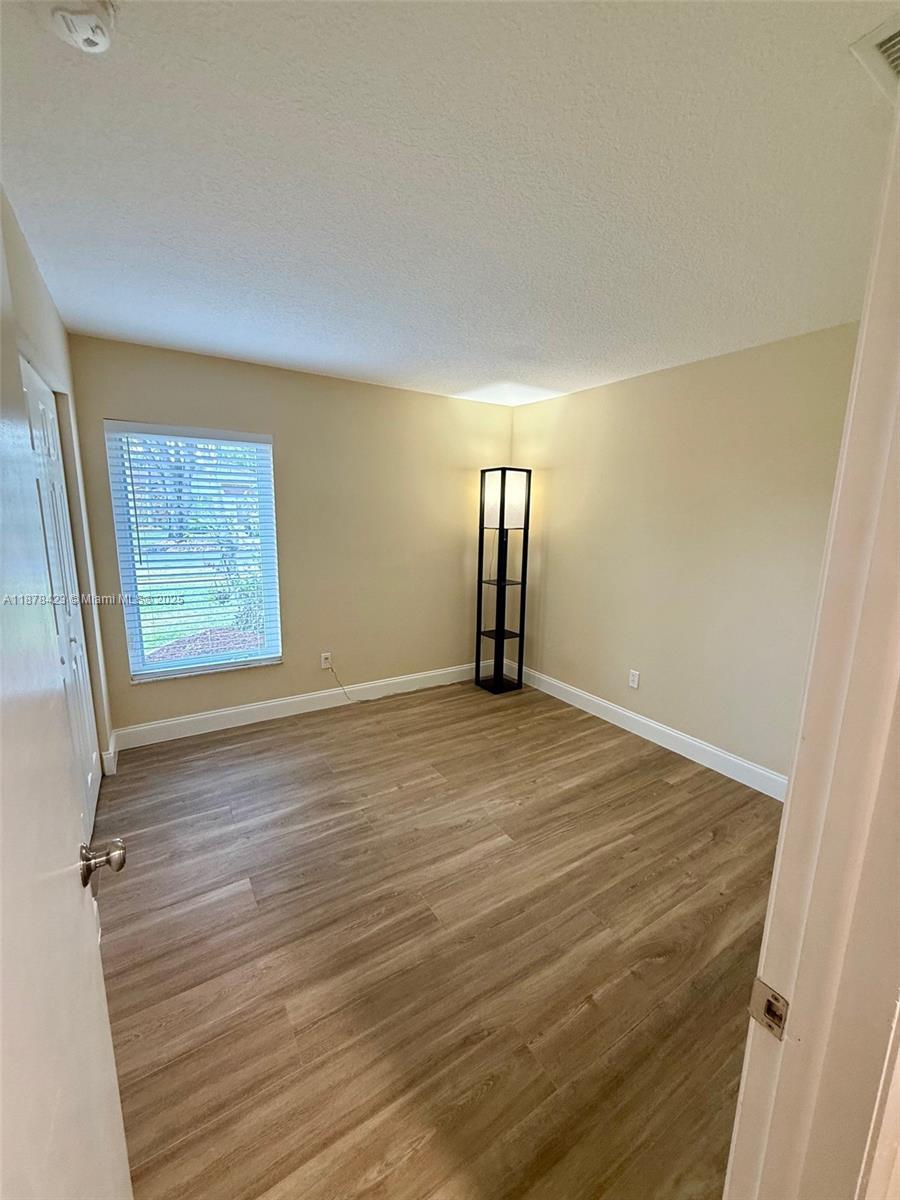 FLAMINGO GARDENS-PHASE TW - Residential Lease