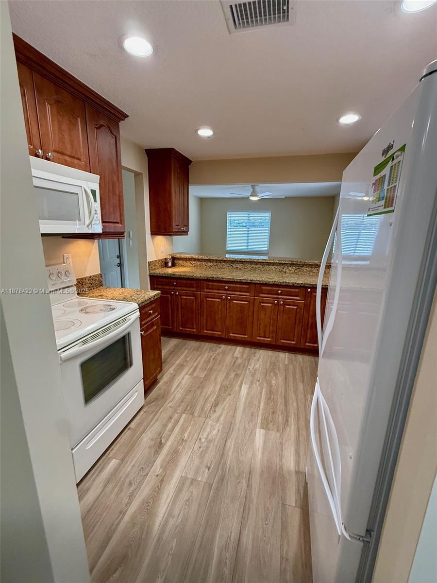 FLAMINGO GARDENS-PHASE TW - Residential Lease