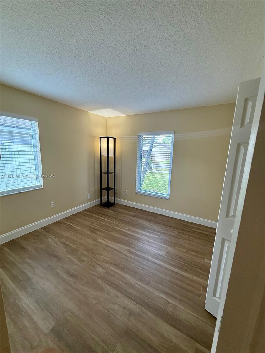 FLAMINGO GARDENS-PHASE TW - Residential Lease