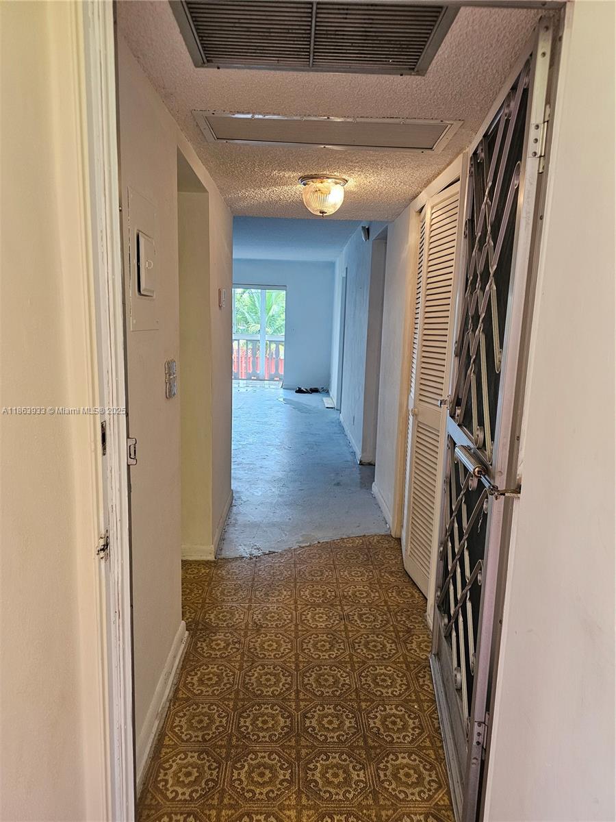 Huge 935+ SQ FT condo in Hallandale's best spot. A perfect opportunity for investment or DIYers! This 2nd floor 2-bedroom, 1 large bath unit needs some TLC , but has great potential and awaits your design flair. Located across from Gulfstream Park. With a free bus line steps away. Don't miss the chance to create equity and style a home to your taste.
