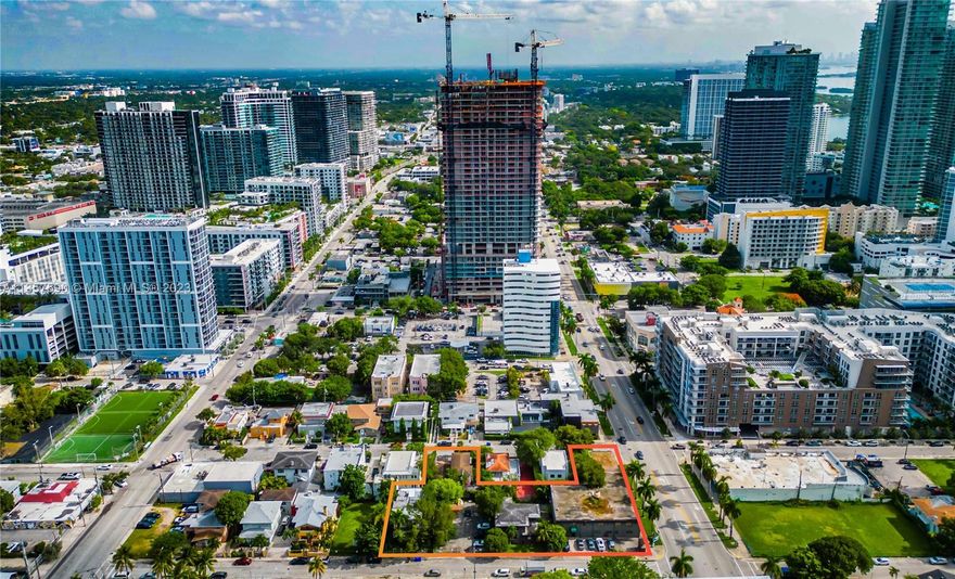 Prime covered land assemblage in the core of Edgewater, a neighborhood that is quickly growing & has extremely central location connecting Downtown, Midtown, Arts + Entertainment, Design District, & Wynwood. Comprised of 5 previously assembled parcels w/ a total of 0.70 acres & features frontage spanning a full city block along Biscayne Blvd. Most notably, included in the sale is a sizeable fully-operational office building of nearly 14,000 leasable SF which can be adapted for a retail use or immediately leased to an office tenant. Additionally, there are 3 existing multi-family buildings totaling 8,151 SF of additional leasable area & a paved parking lot. Zoned T6-36A-O, the assemblage allows a developer to build up to 36 stories & 103 multi-family units, or 206 hotel keys before bonuses.