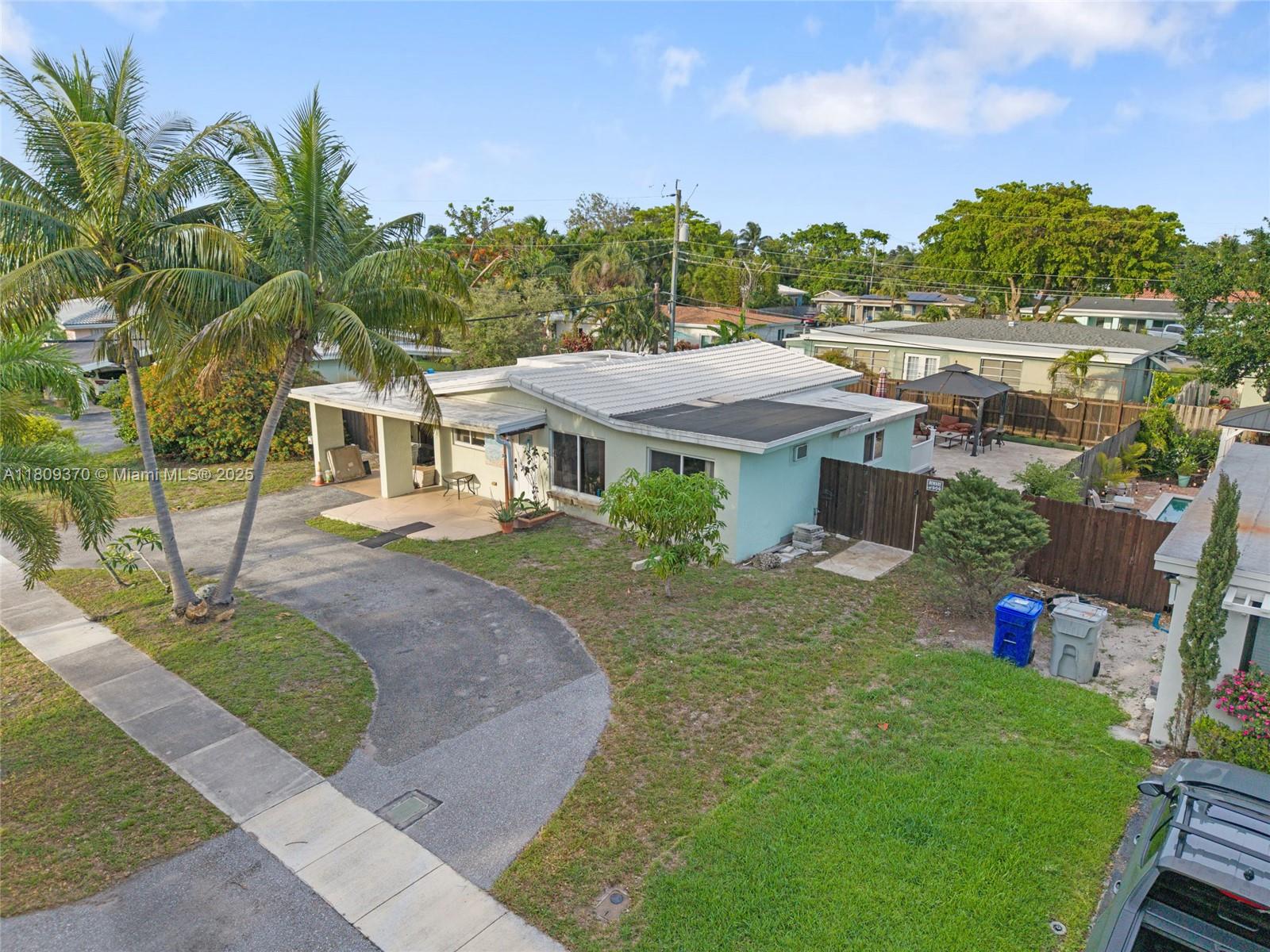 Discover this beautifully updated 3-bedroom, 2-bath home nestled in the desirable Lyons Park neighborhood of Pompano Beach. Enjoy peace of mind with recent upgrades, including remodeled bathrooms, a brand-new 2024 HVAC system, impact windows, and a new water heater.
Inside, you'll find generous closet space and a bright, inviting layout—perfect for comfortable everyday living. Step outside to your private backyard oasis, complete with a sparkling pool ideal for relaxing or entertaining.
All this, just minutes from the beach and local attractions. Don’t miss your chance to own this move-in-ready gem—schedule your private showing today!