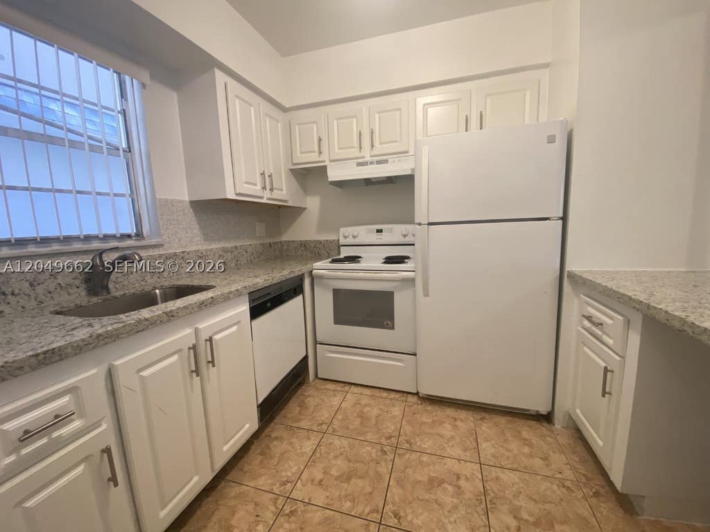 Photo of 6501 Winfield Blvd #A-53, Margate, FL 33063 (MLS # A12049662)