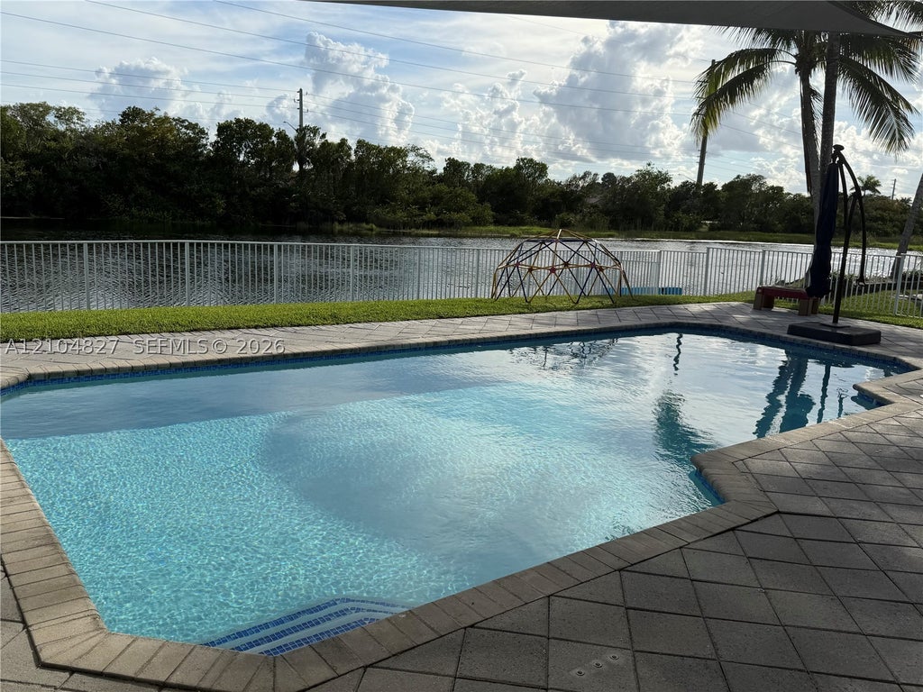 Photo of 17558 SW 13th St, Pembroke Pines, FL 33029 (MLS # A12104827)