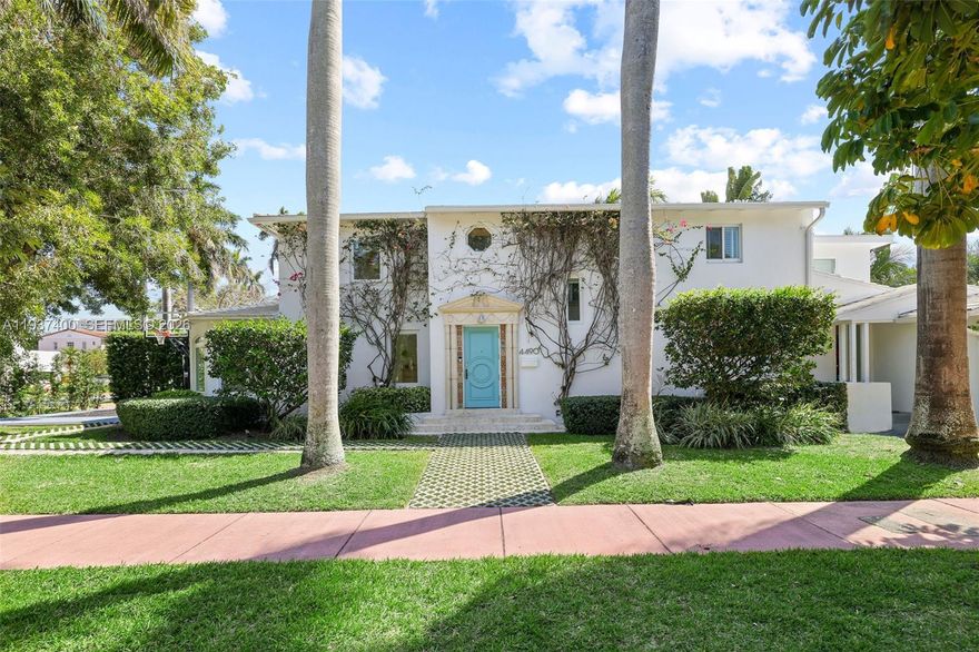 Experience the best of Miami Beach living in this Art Deco corner lot residence. Thoughtfully renovated to preserve its original charm, this two story home features a brand new roof completed in 2025, a grand marble fireplace, and beautifully restored original wood floors throughout. The thoughtfully designed floor plan offers three bedrooms upstairs, including the primary suite, along with two bathrooms. The main level includes an additional bedroom with an en suite bathroom, ideal for guests or multigenerational living. The spacious kitchen blends classic character with modern convenience and offers sleek cabinetry, stainless steel appliances, and a built in wine fridge, making it ideal for both everyday living and entertaining.

Outdoors, enjoy an expansive pool and yard area complemented by a private basketball court. An additional office or flex space, accessible via exterior stairs, provides a versatile setting for a home office or gym. Set on a picturesque tree lined street just minutes from 41st Street shopping, the beach, and with easy access to the Design District, Downtown Miami, and Miami International Airport, this home offers a rare combination of charm, space, and location.