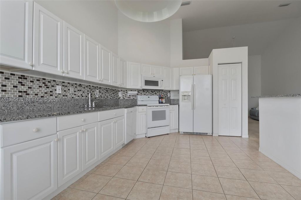 Photo of 7501 S Aragon Blvd #4, Sunrise, FL 33313 (MLS # A11995420)