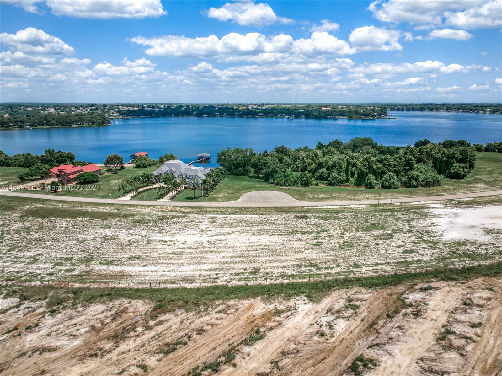 Build your dream home at Lake June Pointe. LOT 491 on this beautiful cleared 1/2 acre lot. The most exclusive private gated community in Lake Placid gives you access to Lake June. Lake June is a 3,500 acre clear water white sand bottom lake, great for all water sports. Walk to the community dock, beach, fish or swim, watch the amazing sunsets, picnic tables, a playground and bathrooms in the community park.