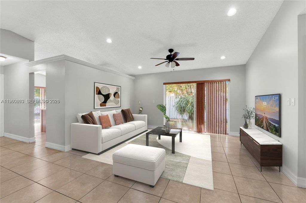 Photo of 1217 NW 125th Ter, Sunrise, FL 33323 (MLS # A11960863)