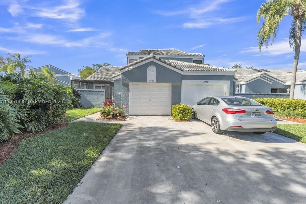 Photo of 8209 Waterford Ave, Tamarac, FL 33321 (MLS # A11951899)