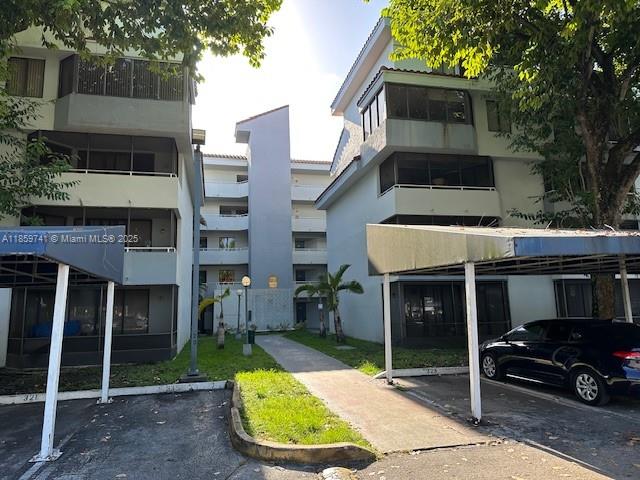 Dont miss out on this freshly painted 2/1 unit in Verabella Falls. Tile floor throughout with large living and dining area. Spacious kitchen with wood tone cabinets and faux granite counter tops, new appliances and pass through area to dining/living room. Interior stackable washer and dryer located right by bedrooms for convenience. Enjoy sitting outside in screened balcony area, with water view. Located close to shopping, schools and entertainment.