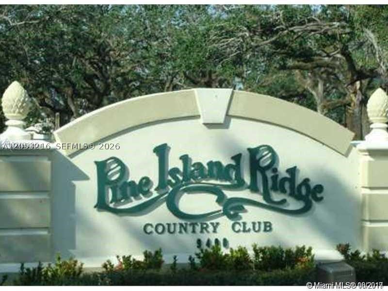 Photo of 1811 Sabal Palm Dr #306, Davie, FL 33324 (MLS # A12053216)