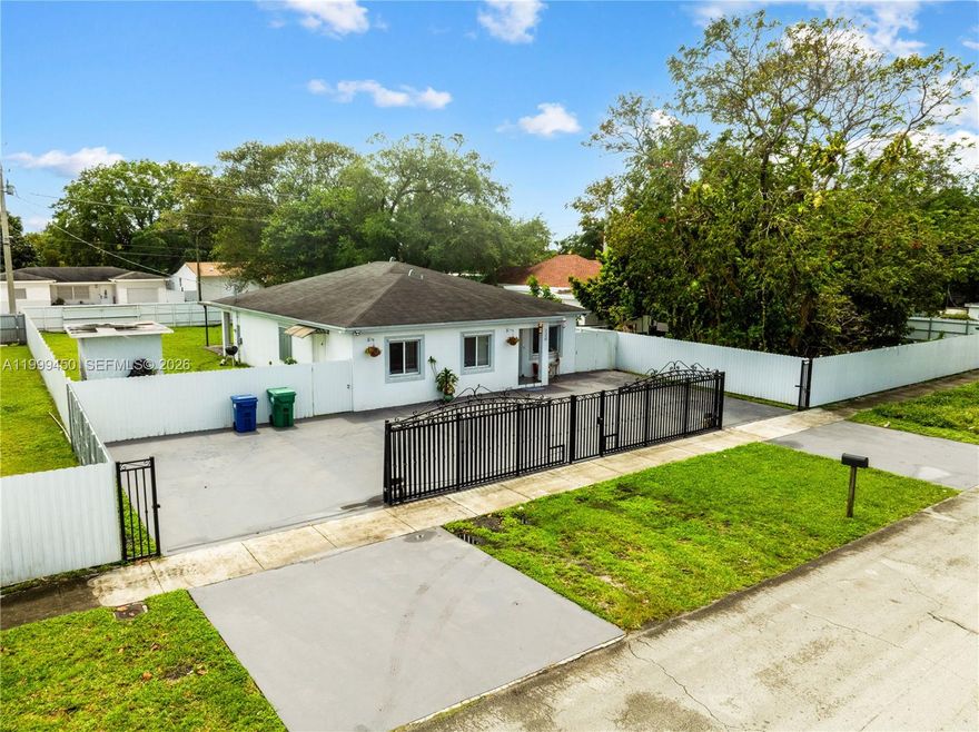 This is the home you’ve been waiting for! Built in 2016, this 4-bedroom, 2-bath features 1,908 sqft of total area,  ceramic tile floors throughout, and a spacious covered terrace perfect for entertaining and BBQs. The oversized yard offers space to build a pool, room for a trailer, rastra, a boat, or an RV, and includes dual access from two streets, with no rear neighbors and a fully fenced lot with an electric gate and a circular driveway. A fantastic opportunity for a growing family or to generate rental income by living in one part and renting the other. Conveniently located between Little River and Miami Shores with easy access to I-95 and major expressways. Don’t miss this opportunity and make it your own!