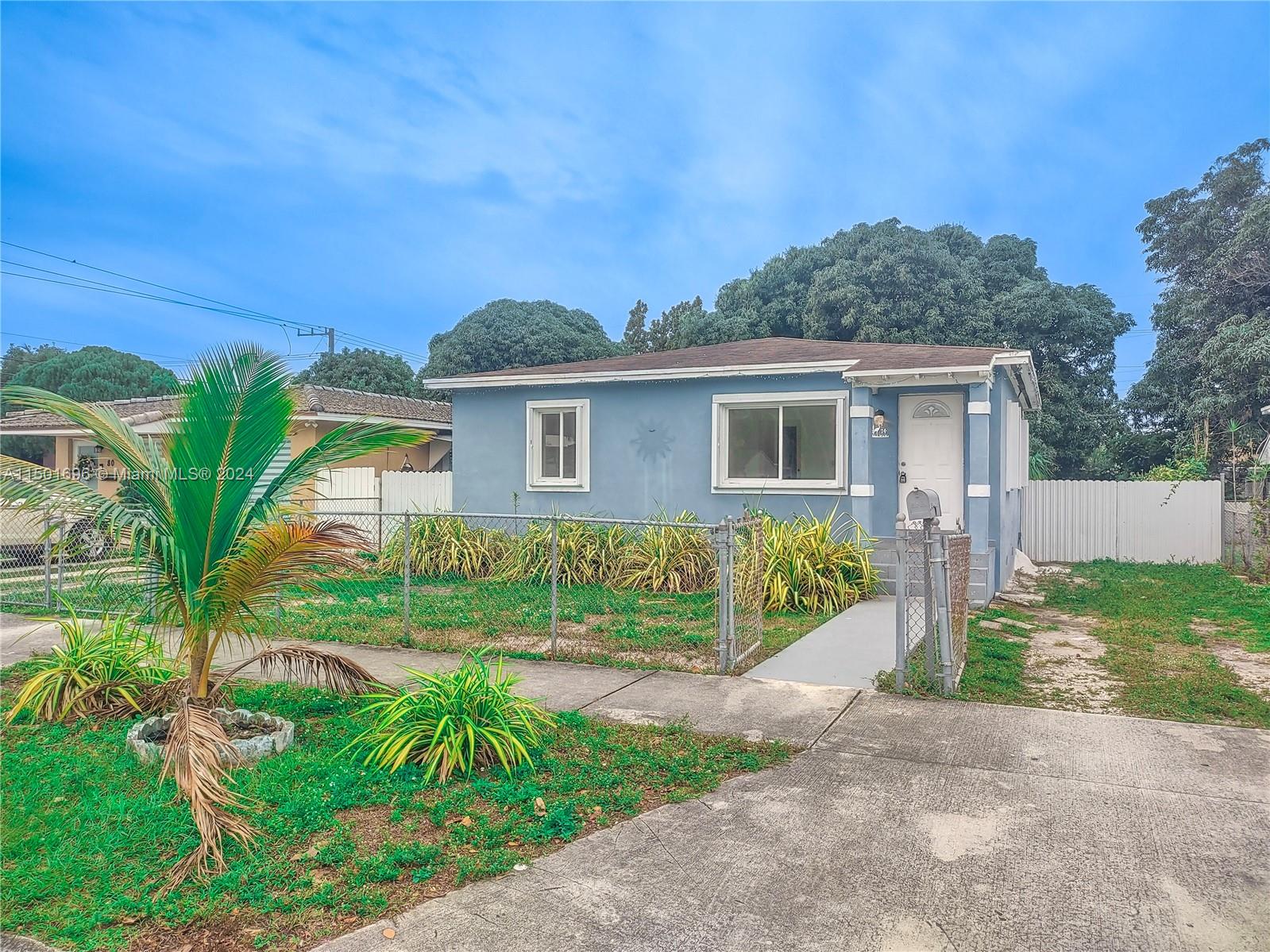 This beautiful 2 bedroom, 1 bathroom single family home is perfect for a growing family. A fresh, modern color scheme with updated lighting and central air conditioning. Enter through the into a full-size living/dining room connecting to a full-size kitchen with breakfast area. The bedrooms have full size closets. Hurricane shutters available for storms. Located on an oversized lot with a large duel driveways plus a huge patio area. There is no shortage of outdoor space. In addition, the yard is fully fenced for privacy. Washer and dryer hookup available.