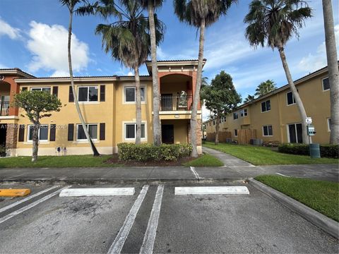 Photo of 935 NE 33rd Terrace #104, Homestead, FL 33033 (MLS # A11940185)
