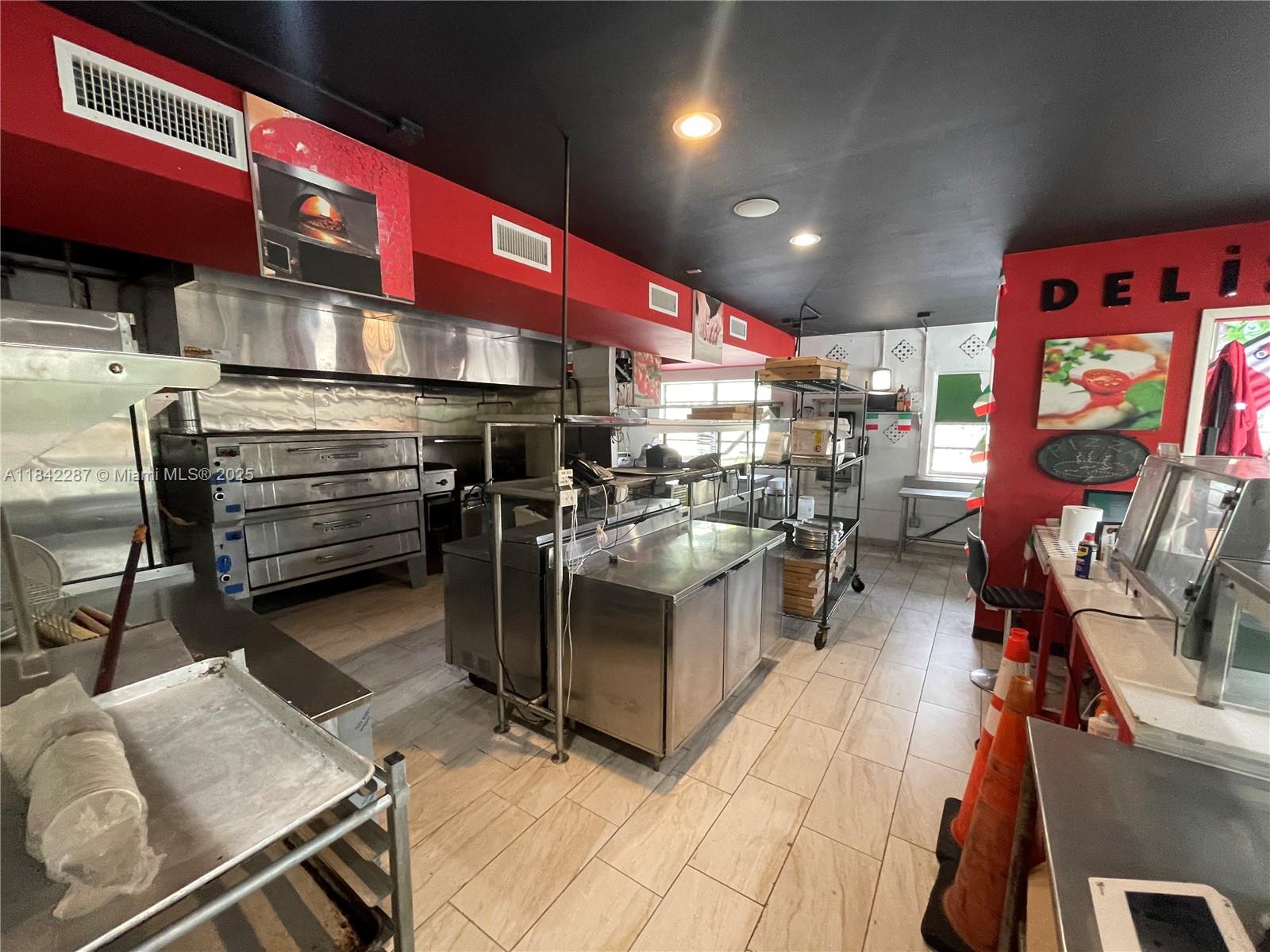 Seize the opportunity to lease a fully built-out, 1,400 sqft. pizzeria in a high-visibility corner unit of a bustling
shopping plaza! This turnkey restaurant is ready to open its doors immediately, complete with a
Certificate of Use transferable to the new operator and all necessary equipment in place. Located adjacent to six
large apartment buildings with over 700 units, this space guarantees a steady flow of local customers.
Additionally, four different schools within a few blocks provide excellent lunchtime and family traffic. The plaza is
anchored by a laundromat and a convenience store, further increasing daily foot traffic, with over 25 dedicated
parking spaces. Fully equipped and ready for immediate operation! This is a ready-to-go space in a thriving
neighborhood.