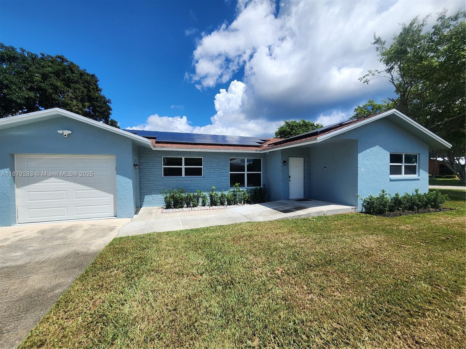 Welcome to a beautiful and perfect condition 4/2 single home in East Delray Beach! Completely renovated with new floors, countertops, bathrooms, impact windows and doors, an amazing pool and big backyard, outdoor seating area, BBQ, very private, quiet, and perfect for entertainment. Insulation was replaced in 2022, and new appliances and solar panels were installed. Plenty of storage with a new shed in the oversized yard and a partial garage with A/C, which could be used as a workshop or additional storage, adapter required for Tesla, room for your boat or your RV. Only a few miles to the beach and Downtown Delray and Boca. The property can be rented with or without furniture, and can be rented for a short or long term. Prime location, don't miss out on this beautiful single home.