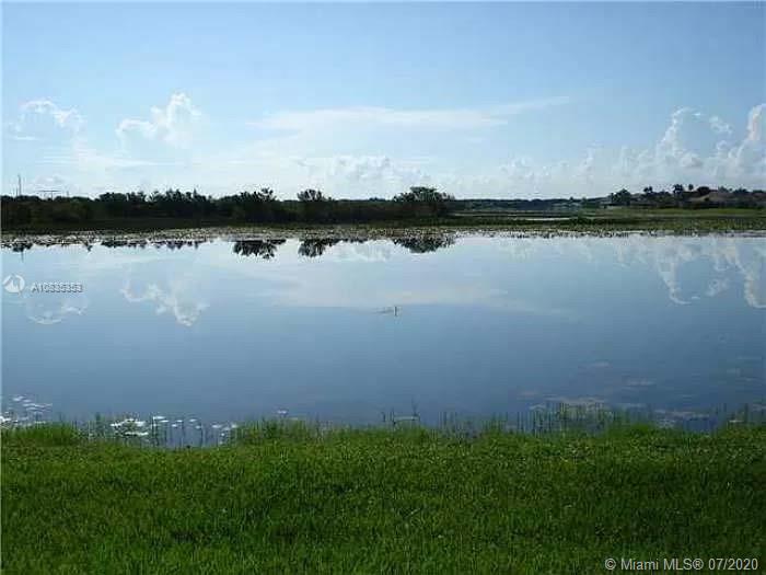 Awesome Lake view, recently upgraded home, beautiful kitchen with granite countertops, new vanities great schools, community pool, easy access to expressways