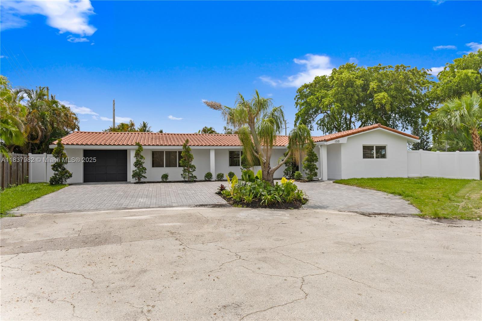 Experience waterfront living in this beautifully renovated 3-bedroom, 2-bath home with a spacious office, ideally located on a quiet cul-de-sac in Pompano Beach. The thoughtfully updated open floor plan is filled with natural light and features modern finishes throughout. Enjoy serene canal views and refreshing coastal breezes from the expansive backyard, perfect for relaxing or entertaining guests. Boaters will love the 83 feet of deeded seawall and private 18.5-foot dock. Located in a non-HOA community, this property offers freedom and flexibility for personal use or investment. Minutes from top-rated schools like Pine Crest, Cardinal Gibbons, and Floranada Elementary, plus beaches, dining, and shopping. This move-in-ready gem captures the essence of year-round Florida living.