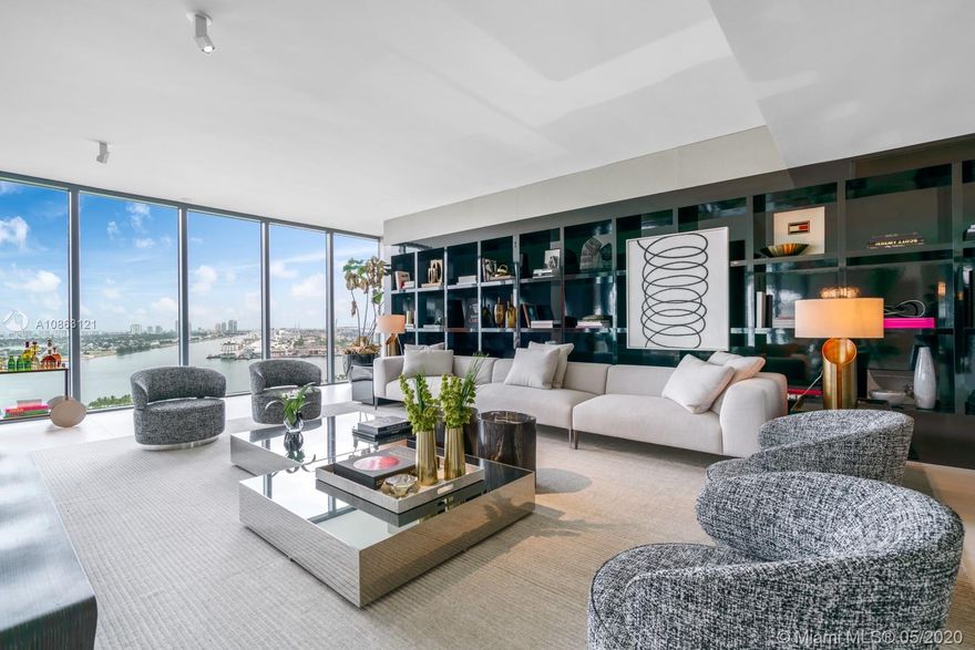 One Thousand Museum by Zaha Hadid, Miami’s most prestigious address presents this elegant turn-key ½ floor residence immaculately designed by Chris Hamoui & Fabio Morozini and furnished by Artefacto. Nested on the 21st floor and showcasing pure luxurious space with 4 bedrooms, 5.5 baths, family room and service quarters. The oversized terraces offer unparalleled views of the Museum Park, Biscayne Bay and Atlantic Ocean. Outfitted with the finest finishes such as Poliform, Gaggenau, SubZero, Dornbracht and Creston. 7-Star services and amenities as Helipad, Sky Lounge, fitness, spa, massage and beauty treatment rooms, steam, sauna, indoor & outdoor pools, multimedia theater, valet, doorman, concierge, private Beach Club in South Beach with private resident’s only car.