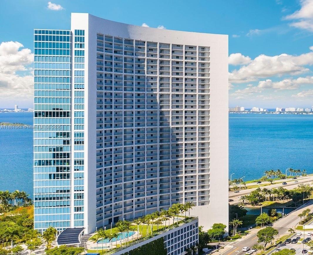 Beautiful two-level unit with two master bedrooms and two parking spots! Enjoy breathtaking Miami, SoBe, and Bay views. Features stainless steel appliances, custom closets, marble floors, high ceilings, rolling shades and storage unit. Full-service building with valet, security, and concierge. Showings with 24-hour notice. Unit can be rented furnished or unfurnished.
