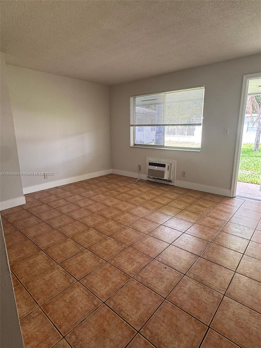 Partially remodeled studio apartment with 1 full bathroom located in the heart of Hollywood. This unit features wall A/C and includes 1 assigned parking space. Trash is included in the rent. Utilities are billed separately: water at a flat rate of $55/month and electricity at a flat rate of $75/month. The unit is being rented AS IS. Pet-friendly community with an additional monthly pet fee of $35. Conveniently located near Downtown Hollywood, shopping, dining, and public transportation. Monthly gross household income must be 3x the base rent. No prior evictions or violent criminal history. Deposits for move-in: 1st month's rent, last month, and a 1-month security deposit.