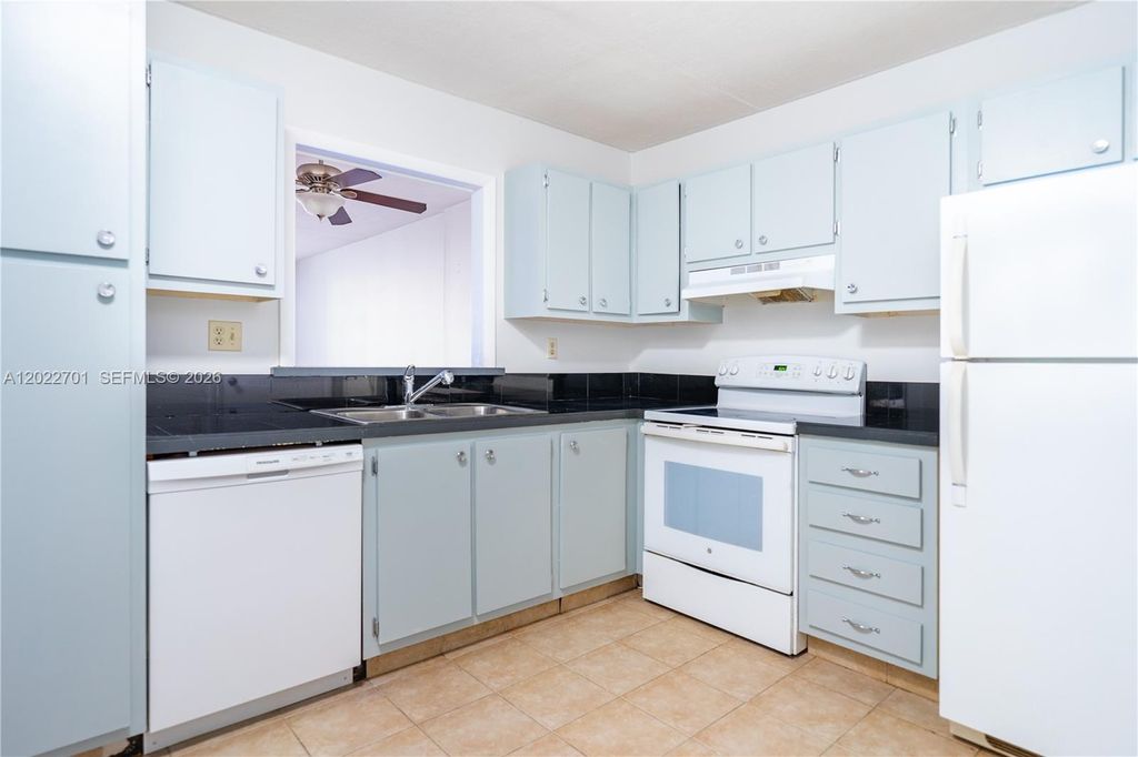 Photo of 406 NW 68th Ave #410, Plantation, FL 33317 (MLS # A12022701)