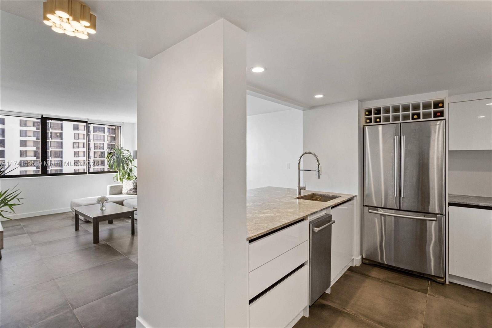 Live in luxury and tranquility in this completely remodeled, 2-bedroom, 2-bath condo in Brickell Key II, offering breathtaking water views from every room. A bright, open-concept design with sleek modern flooring flows seamlessly into the gourmet kitchen, featuring high-end stainless-steel appliances, granite countertops, and spacious island. The expansive balcony, provides a serene space for sunrises and evening breezes. The master suite features a walk-in closet, spa-like bath, second bedroom includes walk-in closet with washer/dryer. Enjoy resort-style amenities, 24-hour concierge, valet, pool, gym, sauna, BBQ area, tennis, and more—while living in a exclusive gated island retreat just moments from the heart of Brickell.