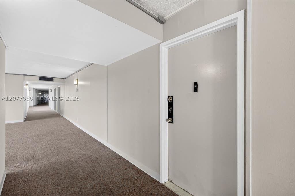 Photo of 401 Golden Isles Dr #708, Hallandale Beach, FL 33009 (MLS # A12077950)