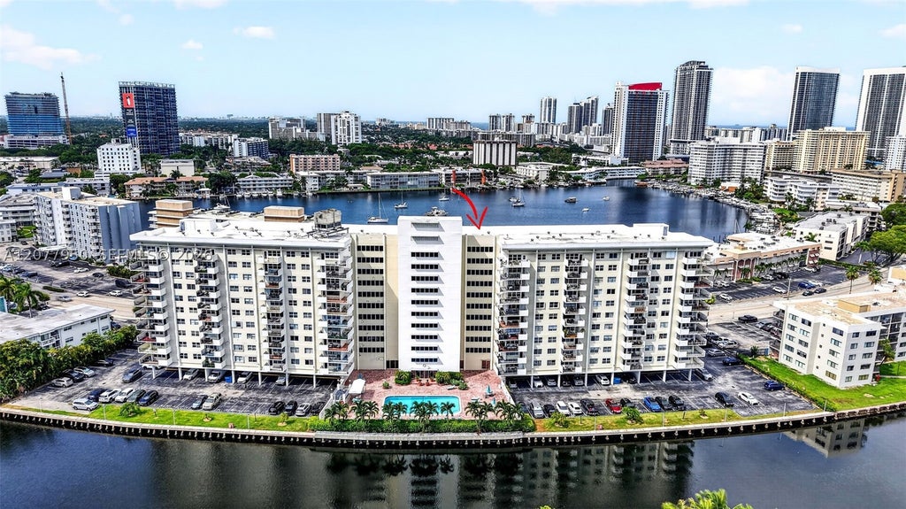 Photo of 401 Golden Isles Dr #708, Hallandale Beach, FL 33009 (MLS # A12077950)
