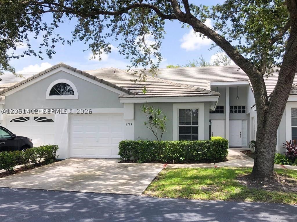 Photo of 8723 Forest Hills Blvd, Coral Springs, FL 33065 (MLS # A12051403)