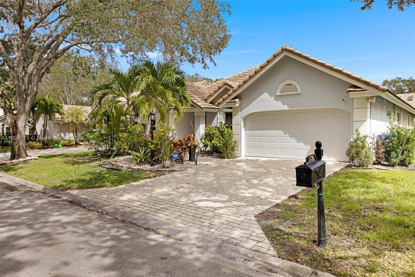 Coral Springs Stunner!~Guard Gated*Turnkey 3-Bed/3-Bath home in Eagle Trace’s Georgetown~Completely remodeled with all-impact windows & doors, large porcelain tile throughout & a bright open split floor plan w/2 skylights~Stunning kitchen w/Quartz countertops & SS appliances~The primary suite offers 2-walk-in closets and a spa-style bath w/freestanding soaking tub & separate shower~All bathrooms have aesthetically appealing decor & quartz countertops~*1-guest suite includes a private bath~Featuring an EV charging station, low HOA dues, & access to the Eagle Trace clubhouse w/Golf & resort-style amenities*Plus Architectural plans for an extended screened patio and added pool are included~Great schools and convenient location!*Close by 12/31/2025 and grab your 2026 Homestead Tax Exemption!