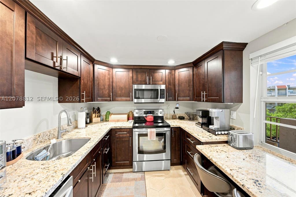 Photo of 3940 Inverrary Blvd #601-A, Lauderhill, FL 33319 (MLS # A12078812)