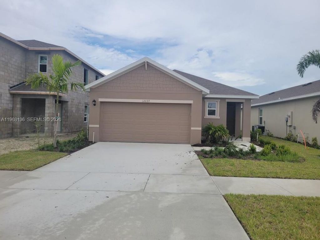 Photo of 12227 SW Nettuno Way, Port St Lucie, FL 34987 (MLS # A11968136)