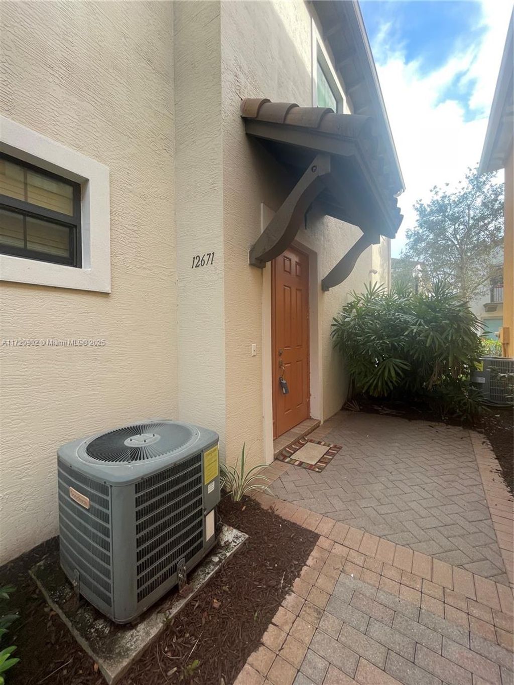 Photo of 12671 NW 32nd Pl #12671`, Sunrise, FL 33323 (MLS # A11720902)