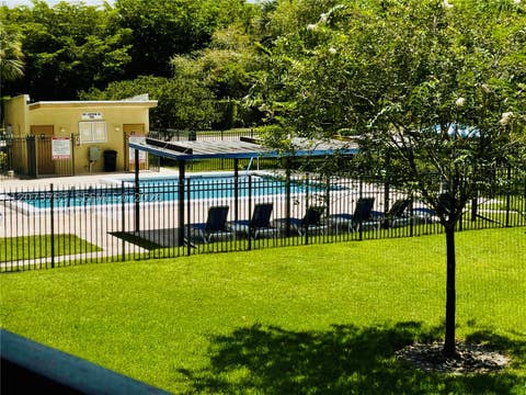 Photo of 307 Lakeview Dr #202, Weston, FL 33326 (MLS # A12073763)