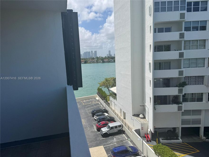 Discover waterfront living at its finest in this bright and spacious 1-bedroom, 1.5-bathroom condo at Island Terrace (Unit 5A) on Belle Isle in Miami Beach’s coveted Venetian Islands.
Boasting approximately 950 square feet of open living space, this inviting residence features a functional layout with an eat-in kitchen, combined living/dining area, walk-in closets with ample storage, and a convenient half-bath for guests. Flooded with natural light and opening to a generous private balcony. Pool are offers stunning water views of Biscayne Bay and the glittering downtown Miami skyline—especially magical at night.
The full-service, bayfront building delivers resort-style living with a heated waterfront pool overlooking the bay, a state-of-the-art fitness center, 24-hour doorman and secured lobby, kayak launch, bike storage, and elegant common areas. One assigned parking space is included, and the community is pet-friendly (with restrictions).
Perfectly situated steps from the Venetian Causeway for biking or jogging, you’re moments from Sunset Harbour’s trendy shops, restaurants, and markets (Trader Joe’s, Whole Foods, Publix), plus easy access to South Beach, Lincoln Road, and all the vibrant energy of Miami Beach. Whether you’re seeking a primary residence, stylish second home, or smart investment, Unit 5A delivers the ultimate Miami Bayfront lifestyle with comfort, views, and convenience.
