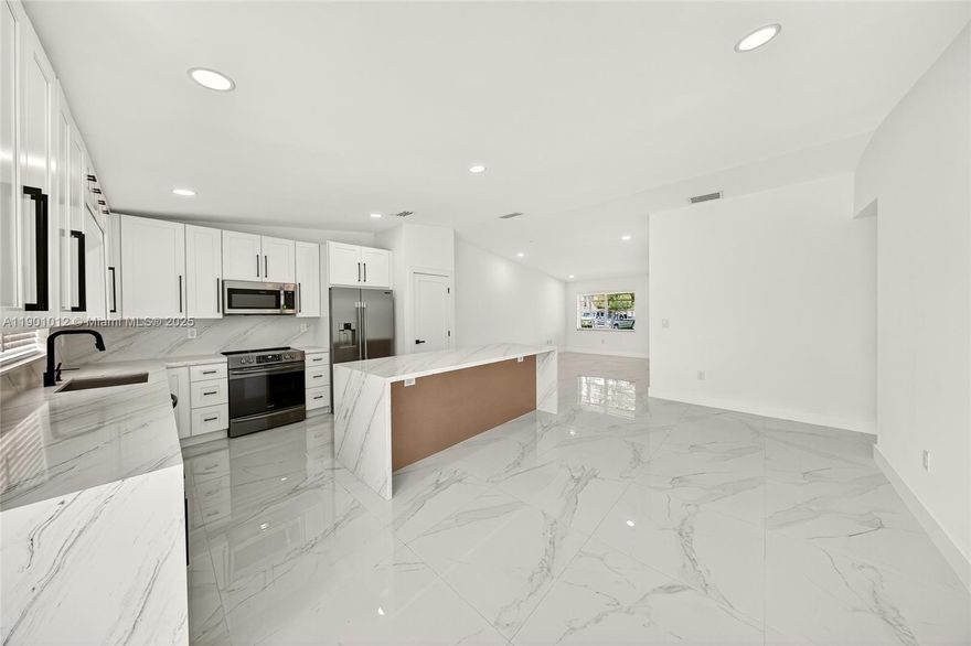 Welcome to Cooper City! Fully remodeled with modern elegance, this home features Spanish porcelain tile throughout, chef-style kitchen with quartz countertops and brand-new stainless steel appliances. Fully renovated bathrooms and kitchen. New A/C, tankless water heater, electrical has been updated. Enjoy a spacious patio perfect for entertaining. Located in a pet-friendly community with low HOA fee. LOW HOA!!!! Reserves exceed 10%. Roof replaced. Association takes care of roof repairs and/or replacement as well as exterior painting. Conveniently near A+ schools, major highways, shopping and more!