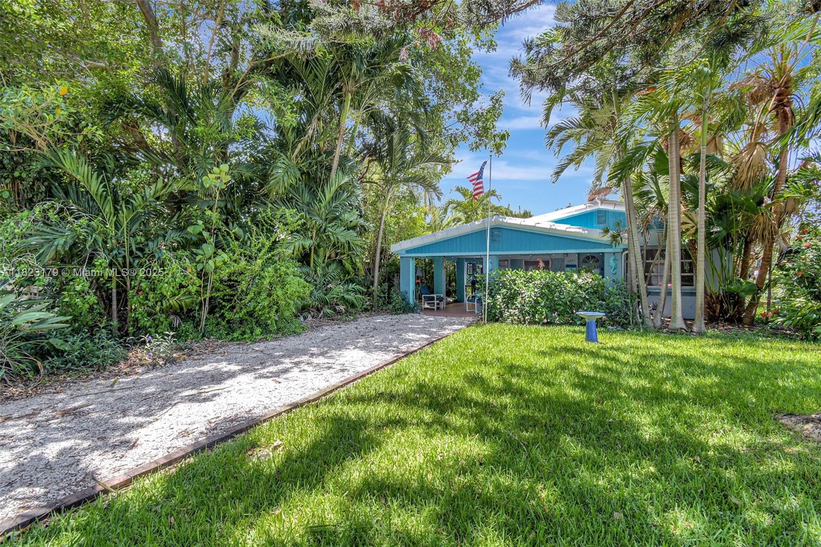 Welcome home to the Heart of North Miami Beach in this Charming 2bedroom 1 bathroom home. Updated kitchen, Oven with air fryer, Ceiling fans, laundry room w/ exterior entrance, huge 2car attached garage set in a peaceful paradise. Hot water heater 1yr. Enjoy gardening, beautiful backyard equipped with a sprinkler system drawn from well water. Garage entrance and Driveway are in the back of the home along with a driveway filled with seashells in front. Delightful Covered wrap around patio is well lite and offers extended living space. Very quiet sort after neighborhood. NO HOA. Cross the street to Greynolds Park, nearby worship. Adventura Mall, beaches, Sunny Isles, Gulfstream, major highways, MIA airport. Don't miss your opportunity to claim this beautiful forever home for yourself.