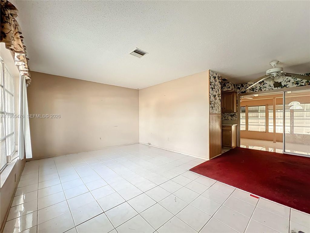 Photo of 310 SE Calmoso Dr, Port St Lucie, FL 34983 (MLS # A11965476)