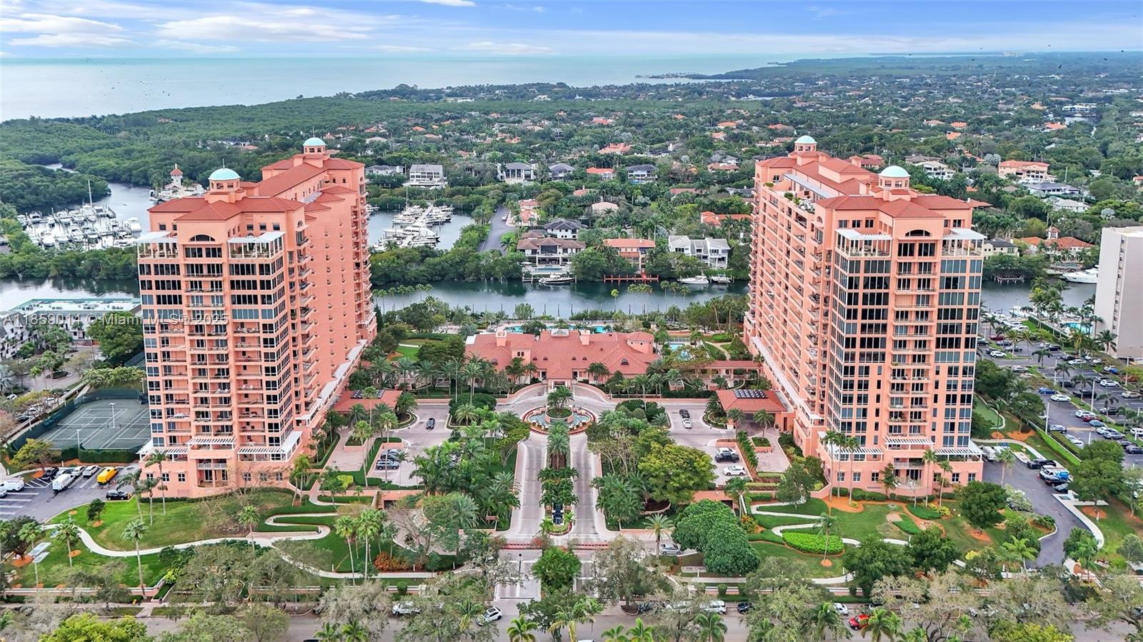 Introducing a one-of-a-kind sky palace, where a fully renovated kitchen flows effortlessly into a west-facing terrace and a north-facing living room framed by floor-to-ceiling windows. Revel in the rare privilege of dual vistas—serene bayside sunrises and dazzling cityscape sunsets. The master suite offers a peaceful sanctuary, complete with a spa-like bath featuring dual sinks, dual commodes, and sweeping city views. A combined laundry and mudroom adds everyday convenience.
As Coral Gables’ only waterfront condominium, this residence offers unmatched 5-star amenities, including three-tier security, full concierge service, a waterfront restaurant, beauty salon, fitness center, spa treatment rooms, lighted Har-Tru tennis courts, marina, putting greens, and a vibrant community atmosphere.