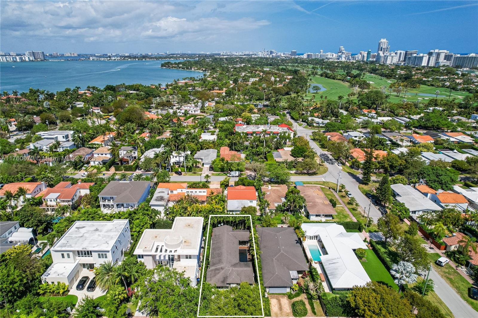 Tropical oasis in the heart of Miami Beach! This stunning modern home has been recently renovated with impeccable taste and premium appliances. Enjoy a magnificent primary bedroom with a secluded patio and the exquisite touch of a custom-made primary closet/bathroom, along with two generously sized bedrooms boasting full bathrooms. Revel in the 11ft high ceilings, Italian ceramic floors, and Mia Cucina custom kitchen & closets. The property's window walls flood the space with natural light, while the wooden pool deck and lush landscaping create the perfect retreat. Nestled in a beautiful and safe neighborhood with no thru traffic, this home offers an exceptional living experience in an unbeatable location. Plus, enjoy a short walk to Fisher Park, enhancing the lifestyle offered here.
