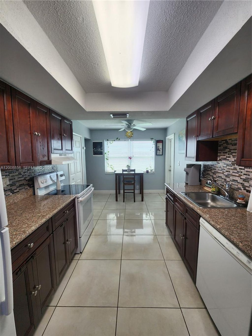 Photo of 3381 NW 33rd Ct, Lauderdale Lakes, FL 33309 (MLS # A12008856)