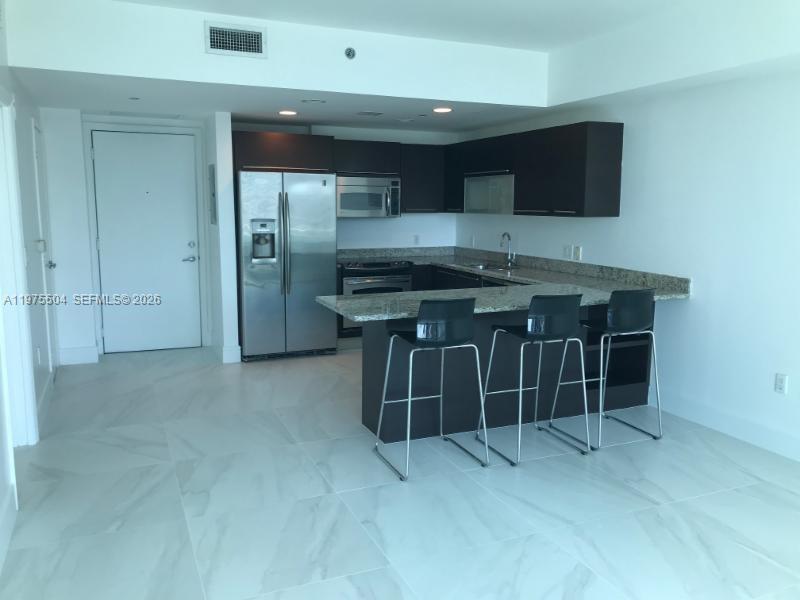 THE PLAZA 851 BRICKELL CO - Residential Lease