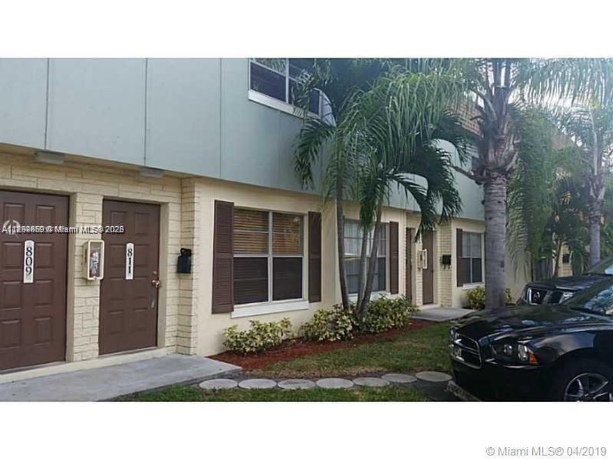 Excellent location! Townhouse 2 bed 1 1/2 baths, tile floor in first floor  and laminate wood in second floor, washer and dryer inside the unit, enclosed fenced patio, A/C. The community offer pool, tennis courts and playground. Centrally located to highways, shopping, restaurants and beaches. The management is inside the complex, Don't miss this opportunity.