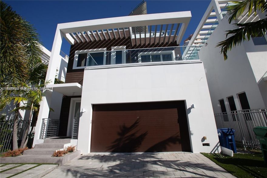 Welcome to the epitome of luxury living! This stunning contemporary masterpiece boasts 7 bedrooms and 7 bathrooms, promising the perfect blend of space and sophistication. As you step inside, the modern design and quality materials immediately catch your eye. Entertaining is a delight in the spacious living room, which effortlessly leads you to the outdoor oasis featuring a sparkling pool and inviting Jacuzzi. But the allure doesn't end there – ascend to the rooftop terrace and discover a second BBQ and a summer kitchen ! Don't miss the opportunity to make this your dream home. Come and experience the epitome of Sunny Isles living – a must-see that promises to captivate and impress even the most discerning buyer.