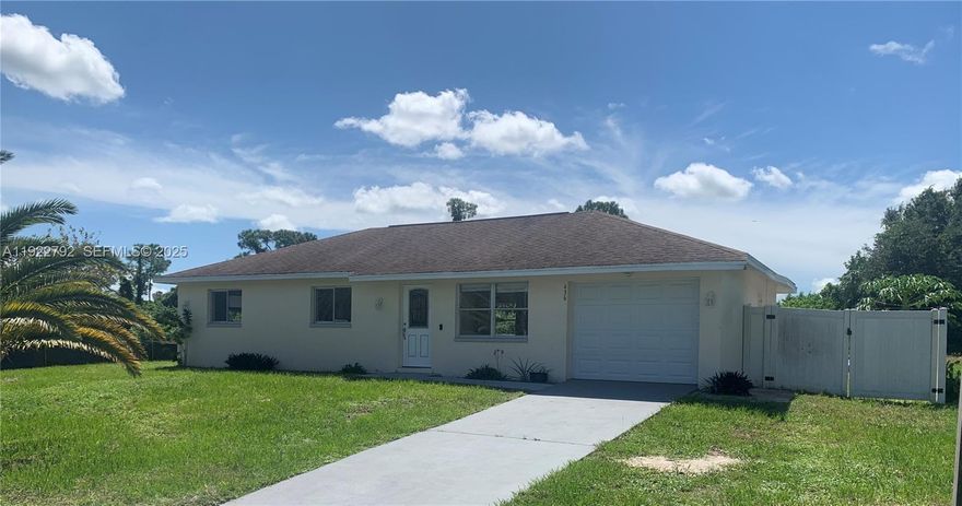 Beautifully maintained home in the heart of Lehigh Acres with city water and sewer. This move-in ready 3-bed / 1-bath property features a bright, open layout, tile flooring throughout, stainless steel appliances, upgraded lighting, and a 1-car garage. Excellent option for first-time buyers or investors looking for a clean, well-kept home in a convenient location close to shopping, schools, and major roads. No HOA.