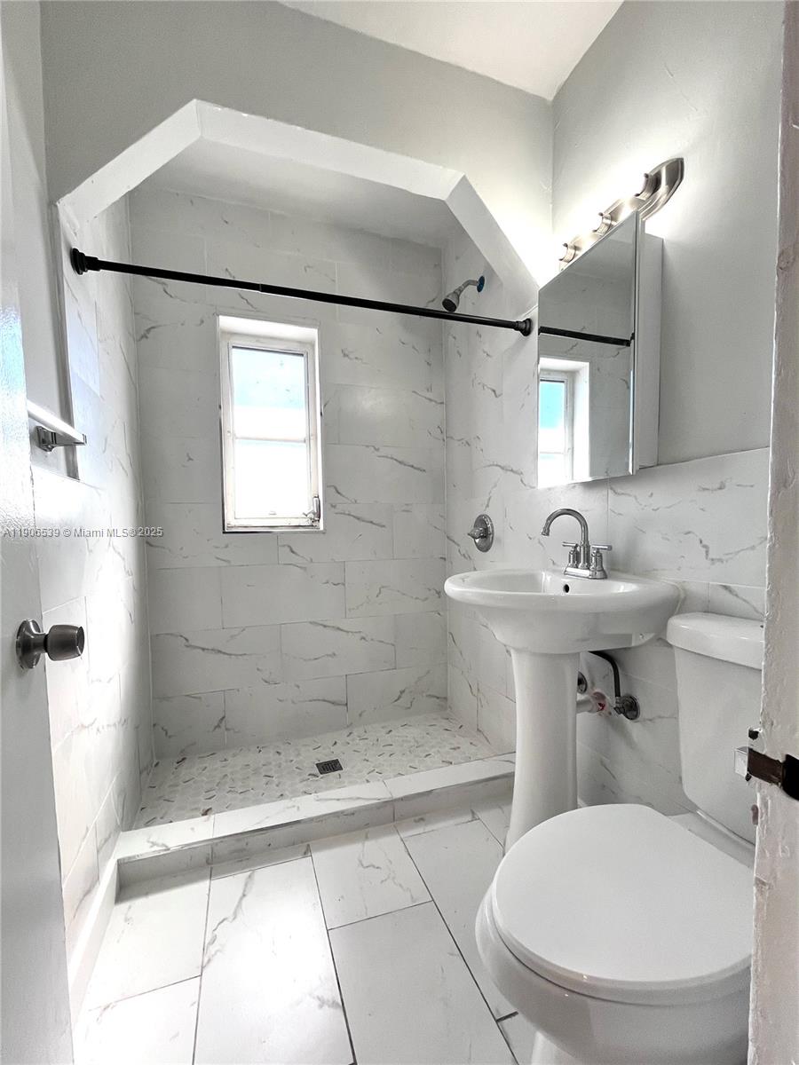 CORAL GARDENS CONDO BLDG - Residential Lease