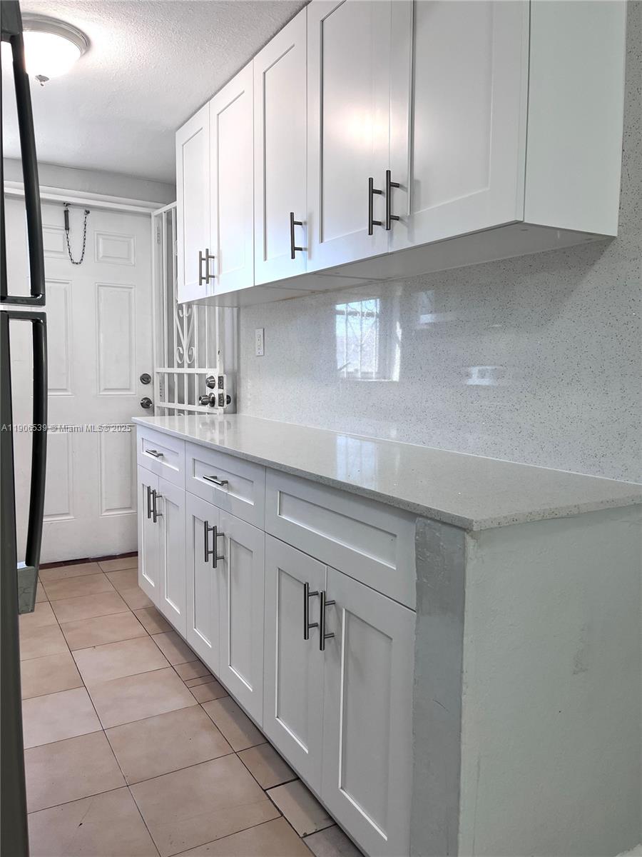 CORAL GARDENS CONDO BLDG - Residential Lease